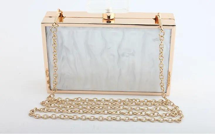 acrylic evening bag with perfume bottle