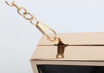 acrylic evening bag with perfume bottle