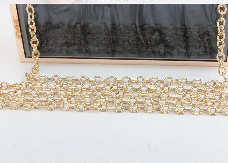 acrylic evening bag with perfume bottle