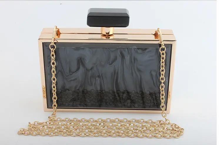 acrylic evening bag with perfume bottle